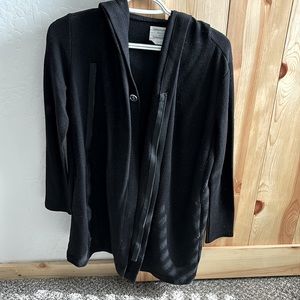 Black fitted sweater that can be worn to the office or a night out